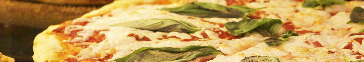 Eating Italian Pizza Sandwich at R&B Brick Oven Pizza restaurant in Saucier, MS.
